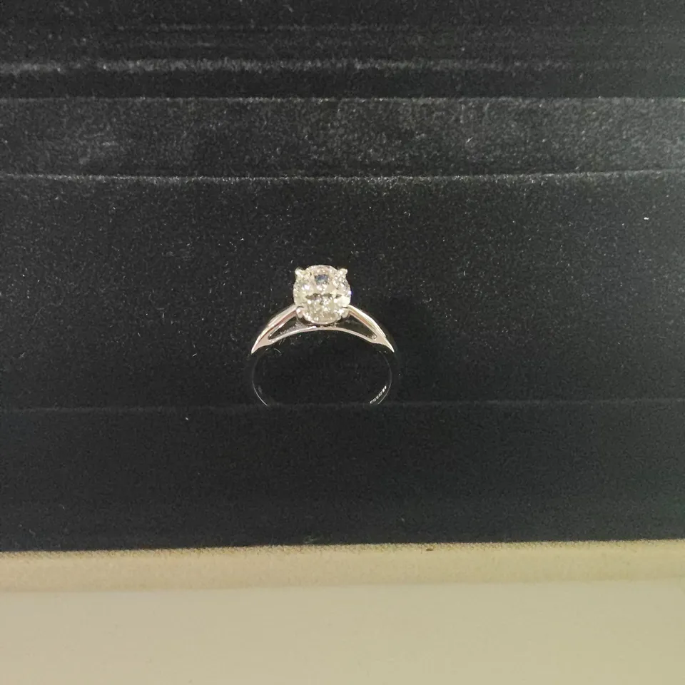 9CT WHITE GOLD SOLITAIRE RING SET WITH A LAB GROWN OVAL CUR DIAMOND WEIGHING +-1.53CT