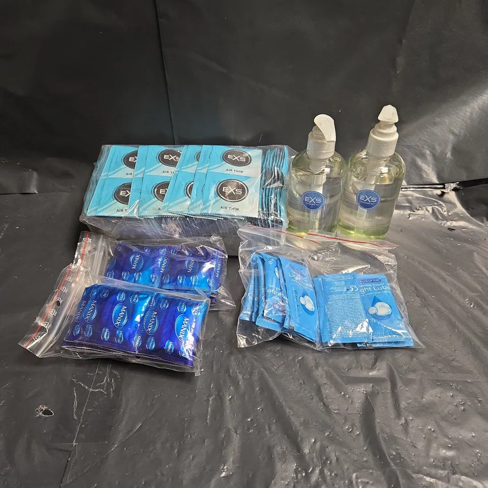 APPROXIMATELY 30 ASSORTED CONDOMS & LUBRICANTS TO INCLUDE - EXS - PASANTE - MANIX