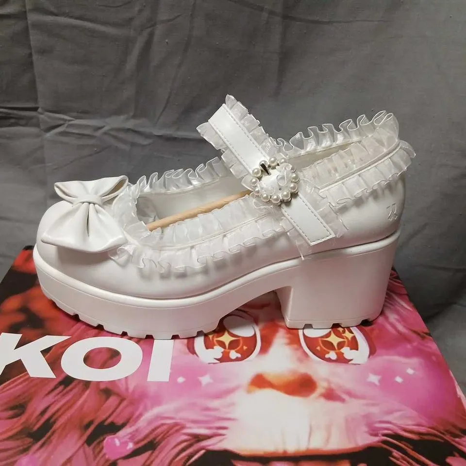 KOI WHITE TIRA RUFFLE MARY JANES – PORCELAIN DELIGHT EDITION UK 6