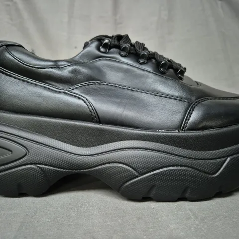 BOXED PAIR OF KOI STRIKER CHUNKY BUBBLE TRAINERS IN BLACK UK SIZE 6