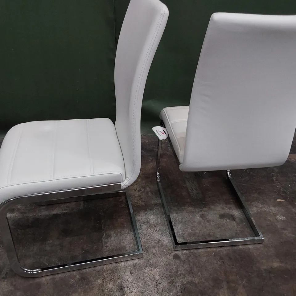 PAIR UPHOLSTERED DINING CHAIRS WHITE PU ON CHROME FRAMES 