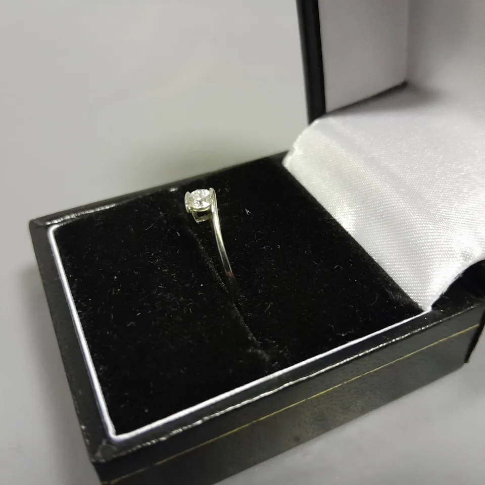 18CT WHITE GOLD NATURAL DIAMOND SOLITAIRE TWIST RING