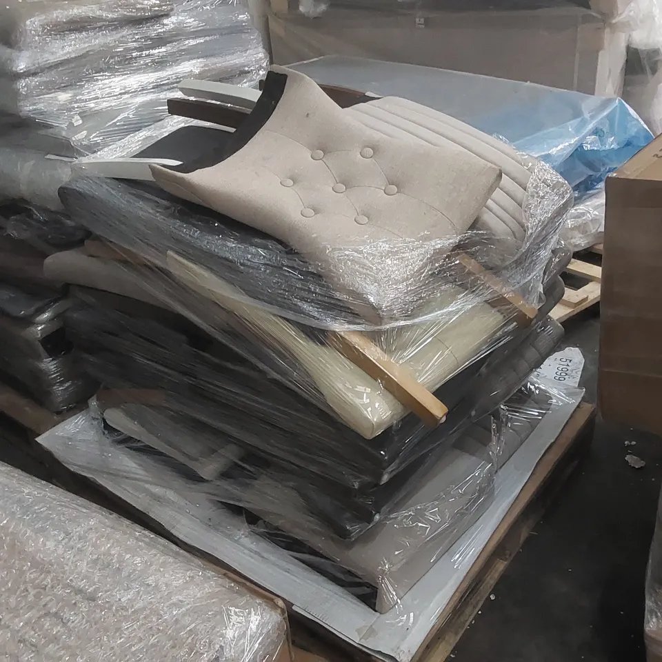 PALLET CONTAINING A LARGE QUANTITY OF DESIGNER CHAIR BACK PARTS