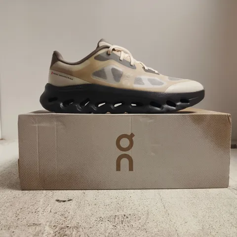 BOXED PAIR OF ON CLOUDTILT REMIX TRAINERS IN DEW/PEBBLE SIZE UK 10