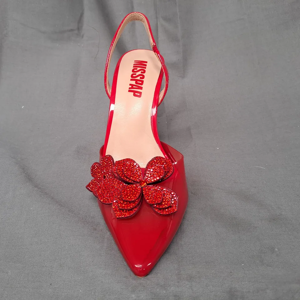 BOXED PAIR OF MISSPAP POINTED TOE HIGH HEEL SANDALS IN RED W. FLORAL DETAIL SIZE 4