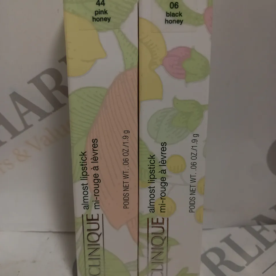 BOX OF 2 CLINIQUE ALMOST LIPSTICKS #44 PINK HONEY & #06 BLACK HONEY 
