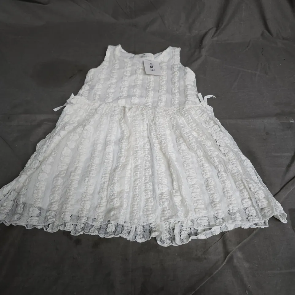 BABY GIRL WHITE LACE DRESS – SLEEVELESS WITH RIBBON DETAILS