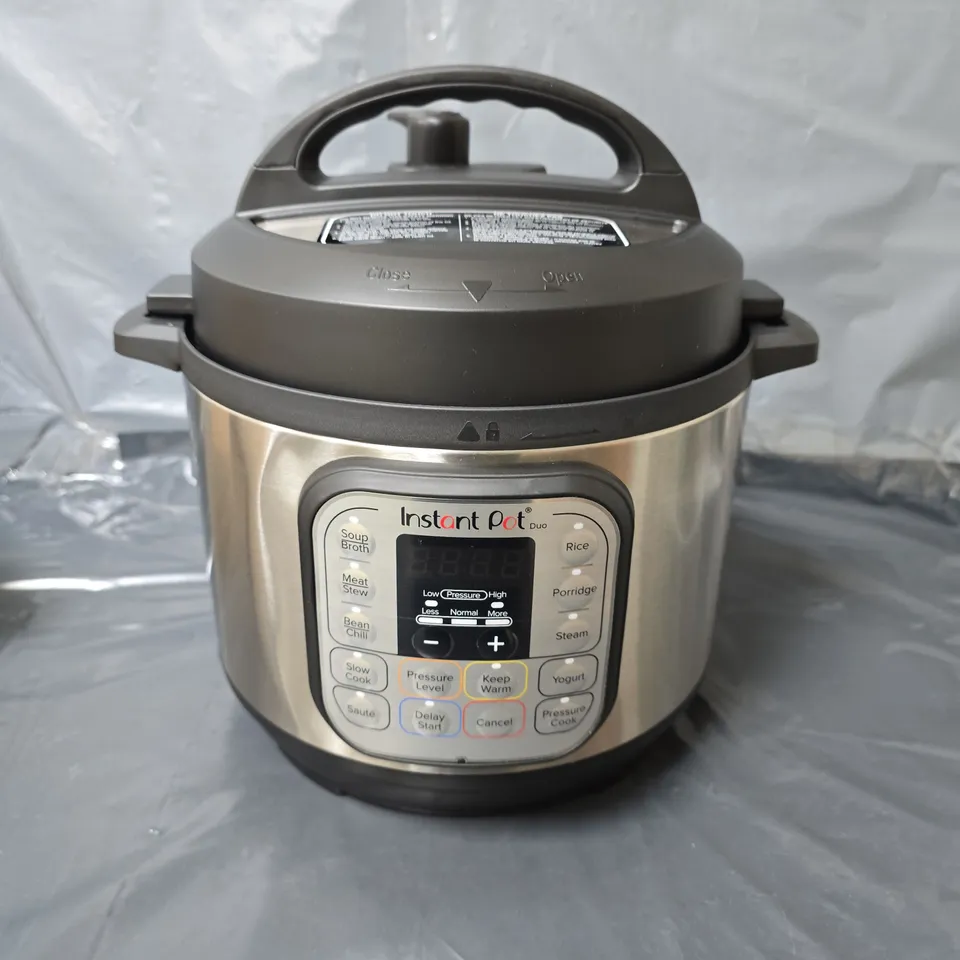 BOXED INSTANT POT DUO MULTI-USE PRESSURE COOKER