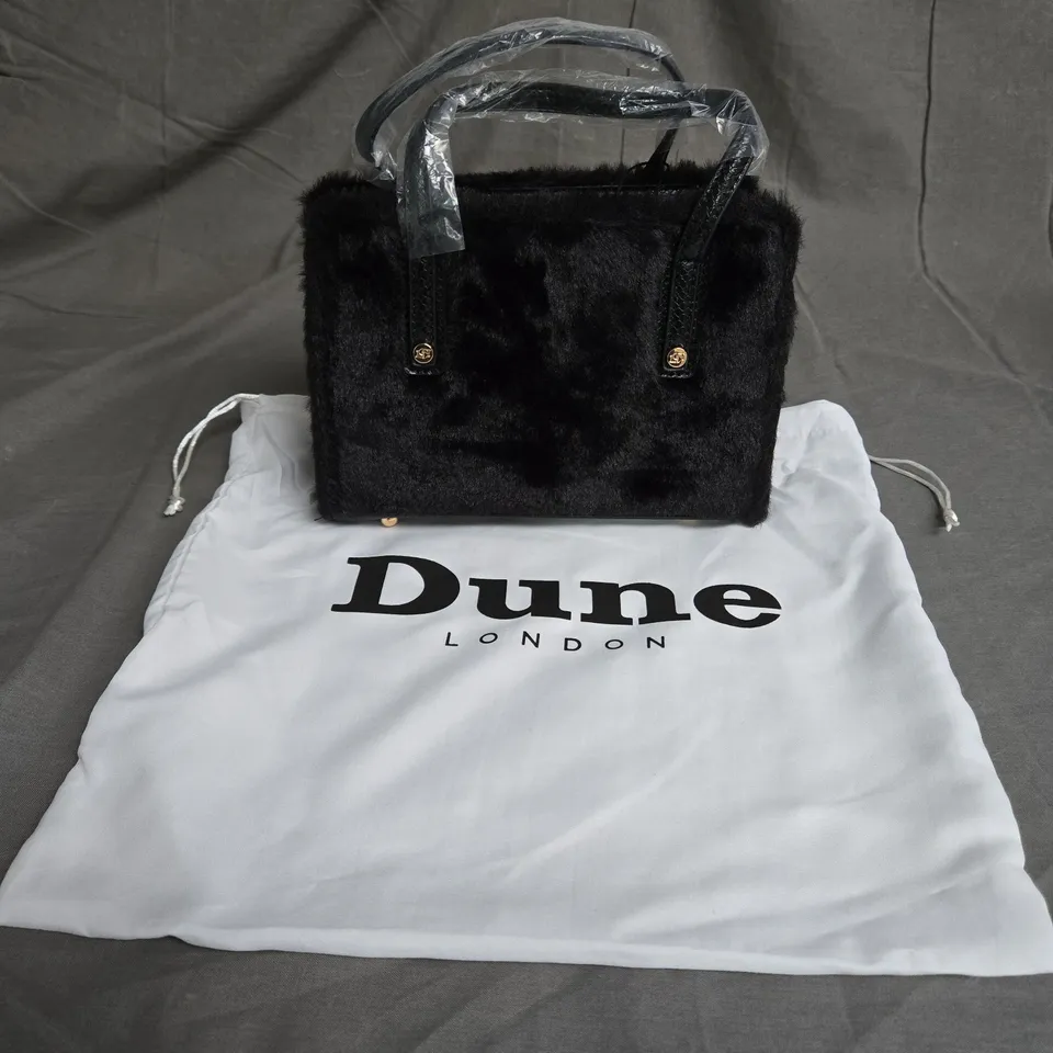 DUNE LONDON MINI BRANDED HANDLET IN BLACK FAUX FUR