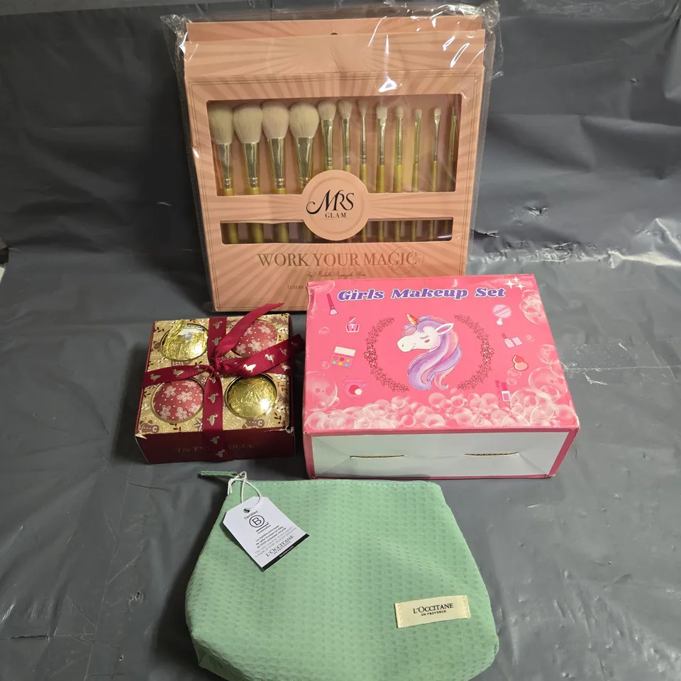 APPROXIMATELY 4 ASSORTED COSMETIC ITEMS TO INCLUDE - L'OCCITANE BATH TRIO - BPERFECT MRS GLAM BRUSH SET - THE FUZZY DUCK BATH BOMB SET