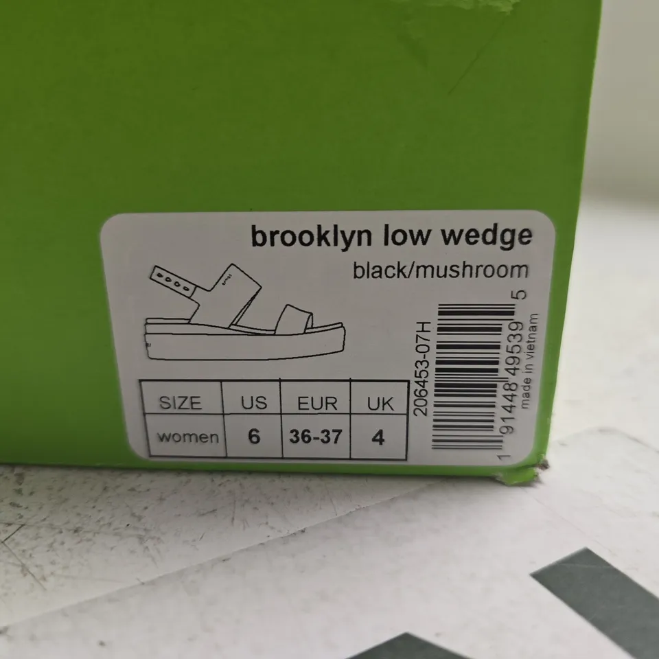 BOXED PAIR OF CROCS BROOKLYN LOW WEDGE SANDALS – WOMEN’S, BLACK/MUSHROOM, UK 4