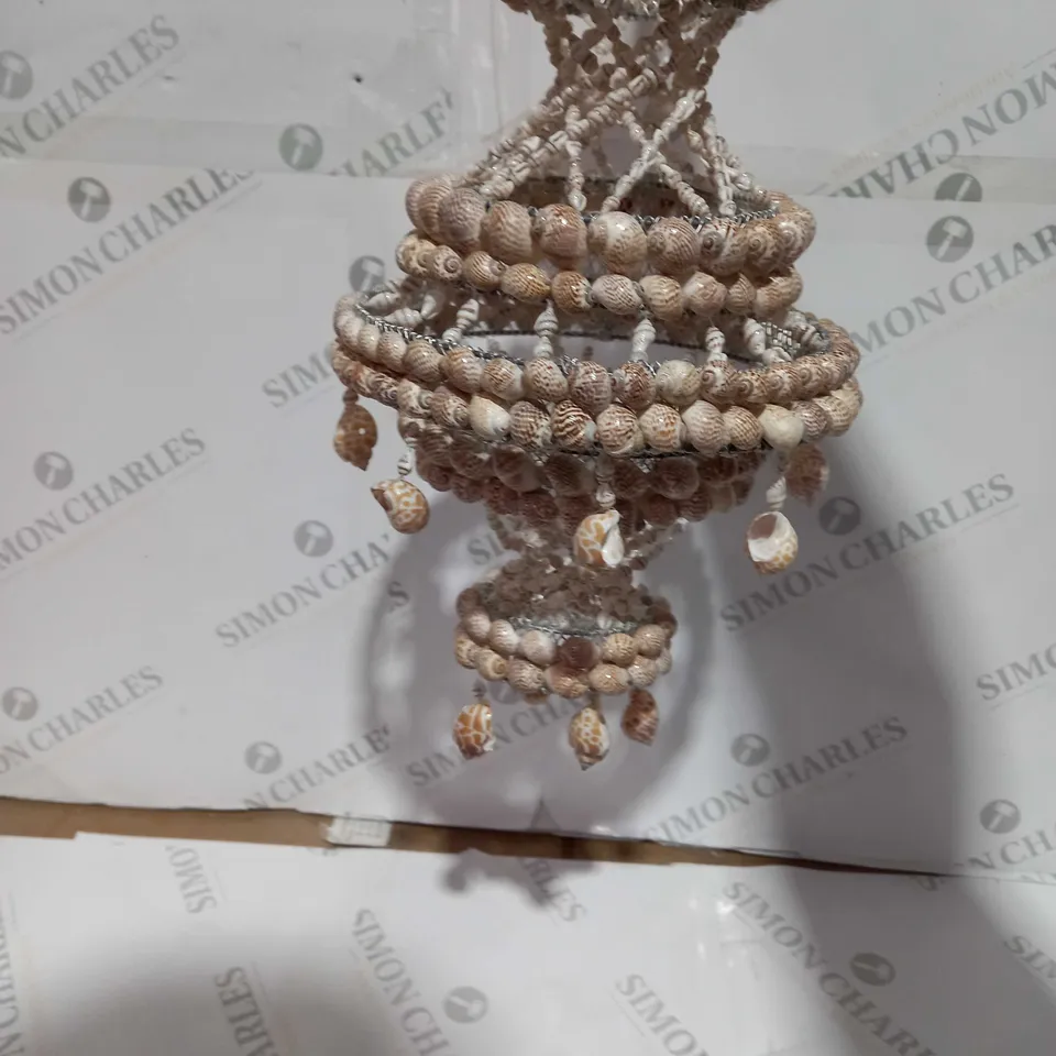 DECORATIVE LAYERED SHELL HANGING PIECE