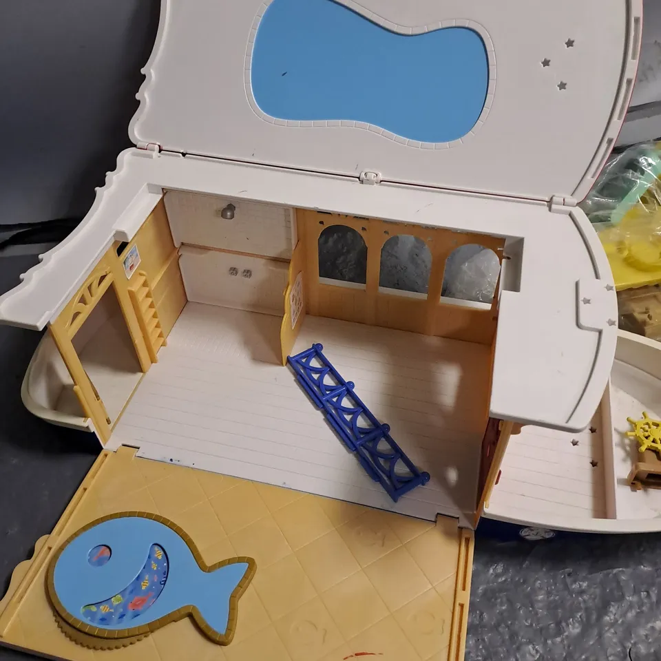 childrens toy boat with accessories and bunny figures