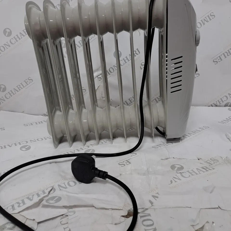 BOXED SWAN 1000W MINI OIL HEATER - WHITE RRP £29