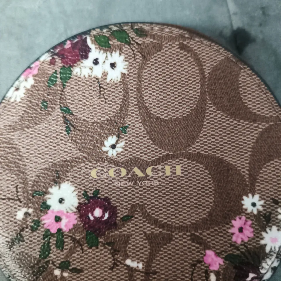 COACH CIRCLE COIN PURSE – BROWN SIGNATURE CANVAS WITH FLORAL PRINT (NEW YORK)