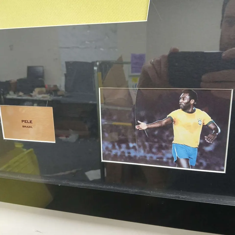 FRAMED PELE PRESENTATION WITH THE ICONIC #10 BRAZIL SHIRT SIGNED 