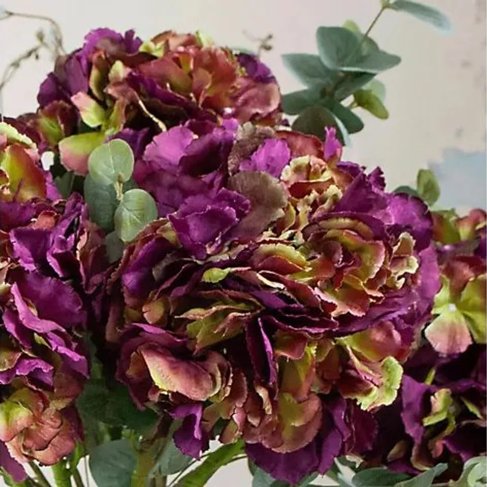 PEONY HYDRANGEA MIX WITH PUSSY WILLOW IN A LARGE FOOTED VASE