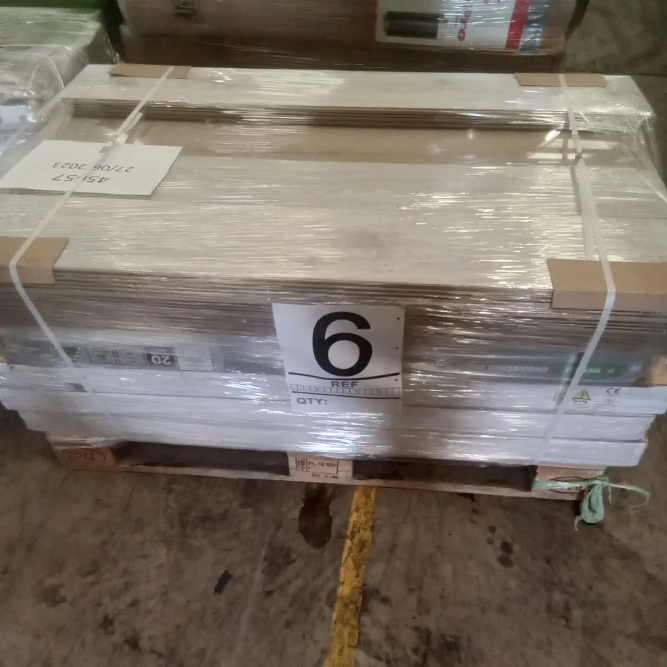 PALLET OF ASSORTED WOODEN LAMINATE FLOORING 26 PACKS OF 7 PLANKS