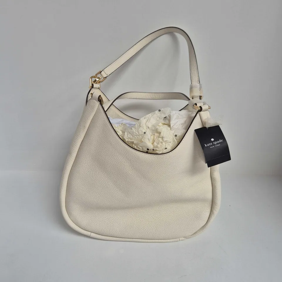KATE SPADE KAYLA PEBBLED LEATHER HANDBAG IN MERINGUE