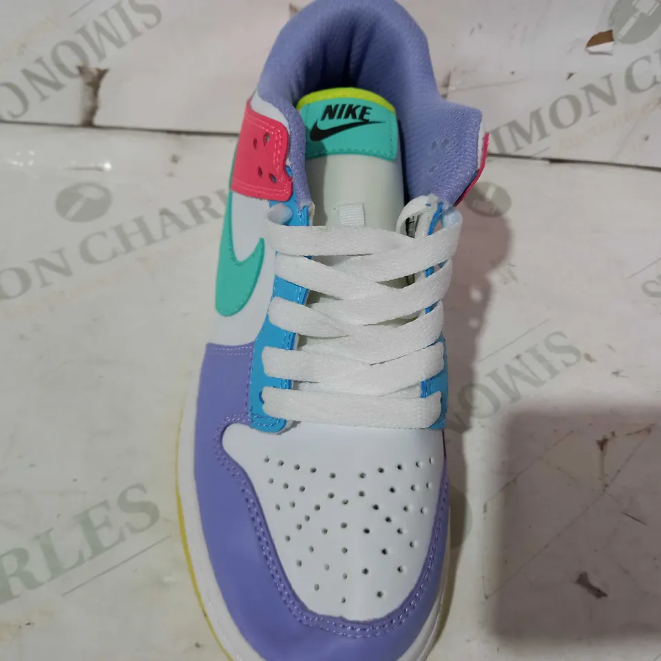 BOXED PAIR OF NIKE TRAINERS IN WHITE/PURPLE/RED/GREEN UK SIZE 4