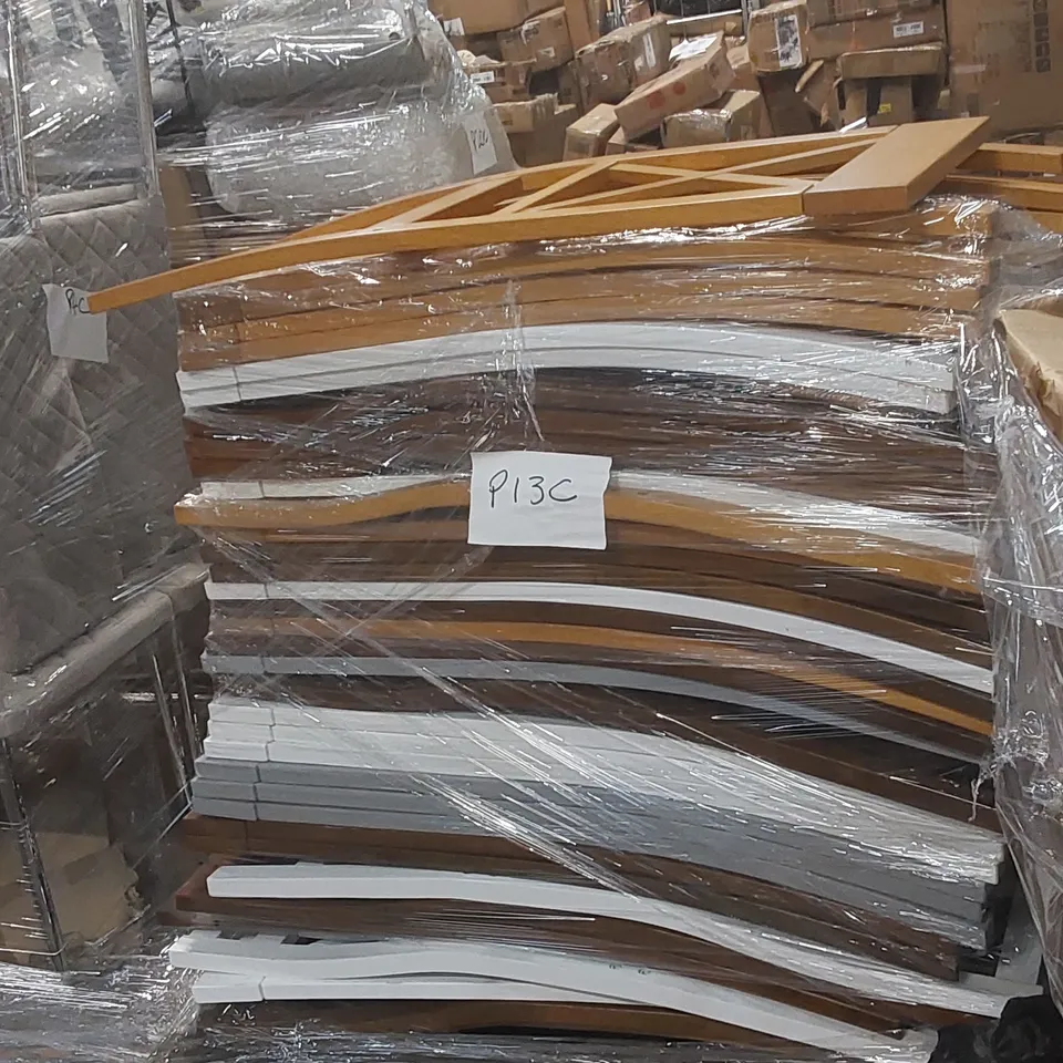 PALLET CONTAINING A LARGE QUANTITY OF DESIGNER CHAIR BACKS