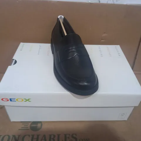 BOXED PAIR OF GEOX SLIP ON SHOES IN BLACK EU SIZE 35