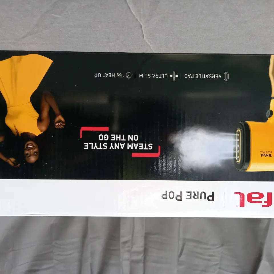 BOXED TEFAL GARMENT STEAMER IN YELLOW