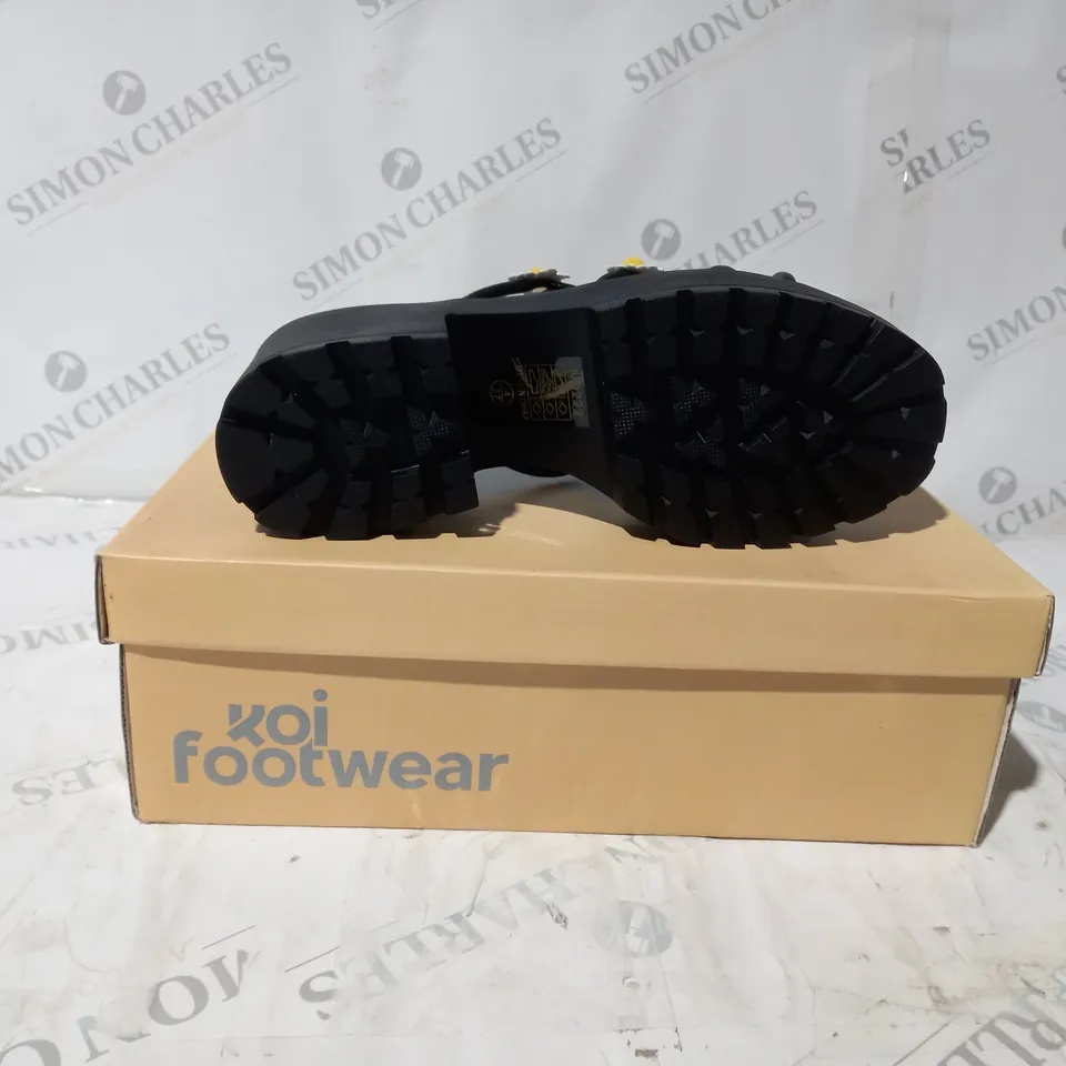 BRAND NEW BOXED PAIR OF KOI VEGAN LEATHER BLOOMING DAISY OASIS STRAPPY SLIDERS IN BLACK UK SIZE 4
