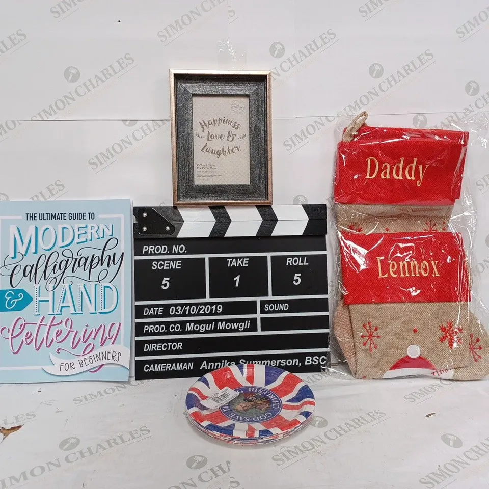 BOX OF APPROX 20 ASSORTED ITEMS TO INCLUDE - KING CHARLES PAPER PLATES - CHRISTMAS STOCKINGS - MOVIE SET CLAPPER BOARD ECT