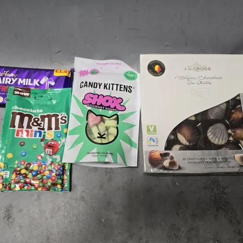 APPROXIMATELY 22 ASSORTED FOOD ITEMS TO INCLUDE - CANDY KITTENS SHOX GOURMET SOURS , M&MS MINIS , CADBURYS FRUIT & NUT BAR ETC