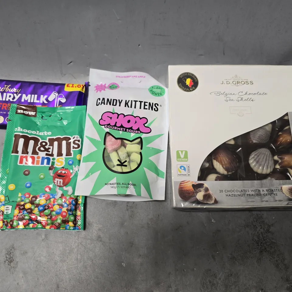 APPROXIMATELY 22 ASSORTED FOOD ITEMS TO INCLUDE - CANDY KITTENS SHOX GOURMET SOURS , M&MS MINIS , CADBURYS FRUIT & NUT BAR ETC