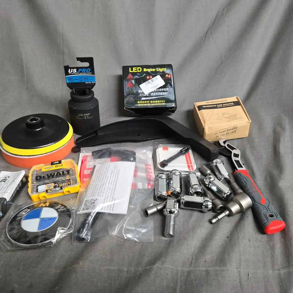 APPROXIMATELY 10 ASSORTED VEHICLE PARTS TO INCLUDE NUTS AND BOLTS, BRAKE LIGHTS AND CAR BADGES