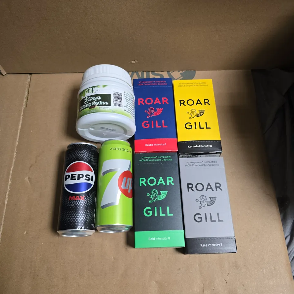 A TOTE OF APROXIMATELY 12 ITEMS TO INCLUDE NESPRESSO CAPSULES, SKINNY COFFE AND FIZZY DRINKS
