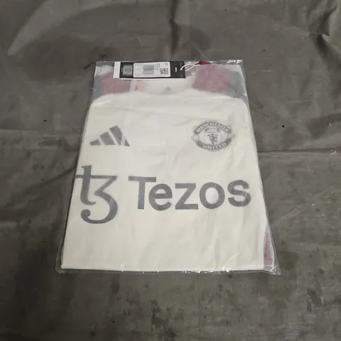 BAGGED ADIDAS MANCHESTER UNITED FC TIRO 24 TRAINING JERSEY IN OFF WHITE MIX SIZE 7-8YRS