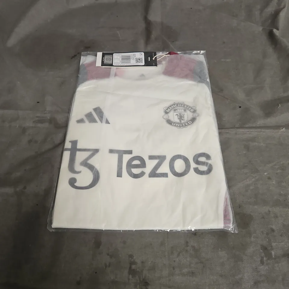 BAGGED ADIDAS MANCHESTER UNITED FC TIRO 24 TRAINING JERSEY IN OFF WHITE MIX SIZE 7-8YRS