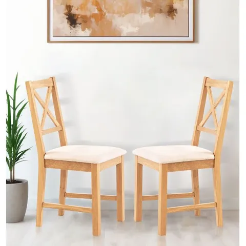 BOXED PAIR OF OAK SMALL CROSS BACK CHAIRS WITH BEIGE FABRIC SEAT