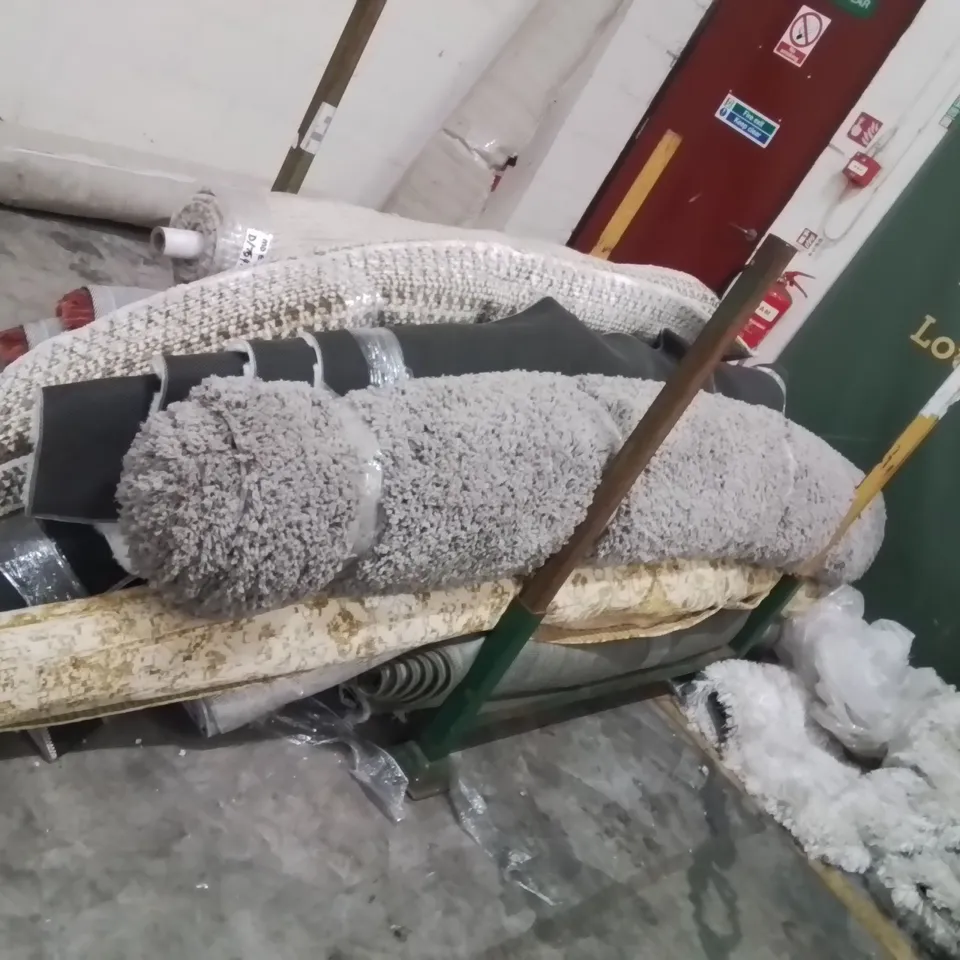 STILLAGE OF APPROXIMATELY13 QUALITY DESIGNER RUGS