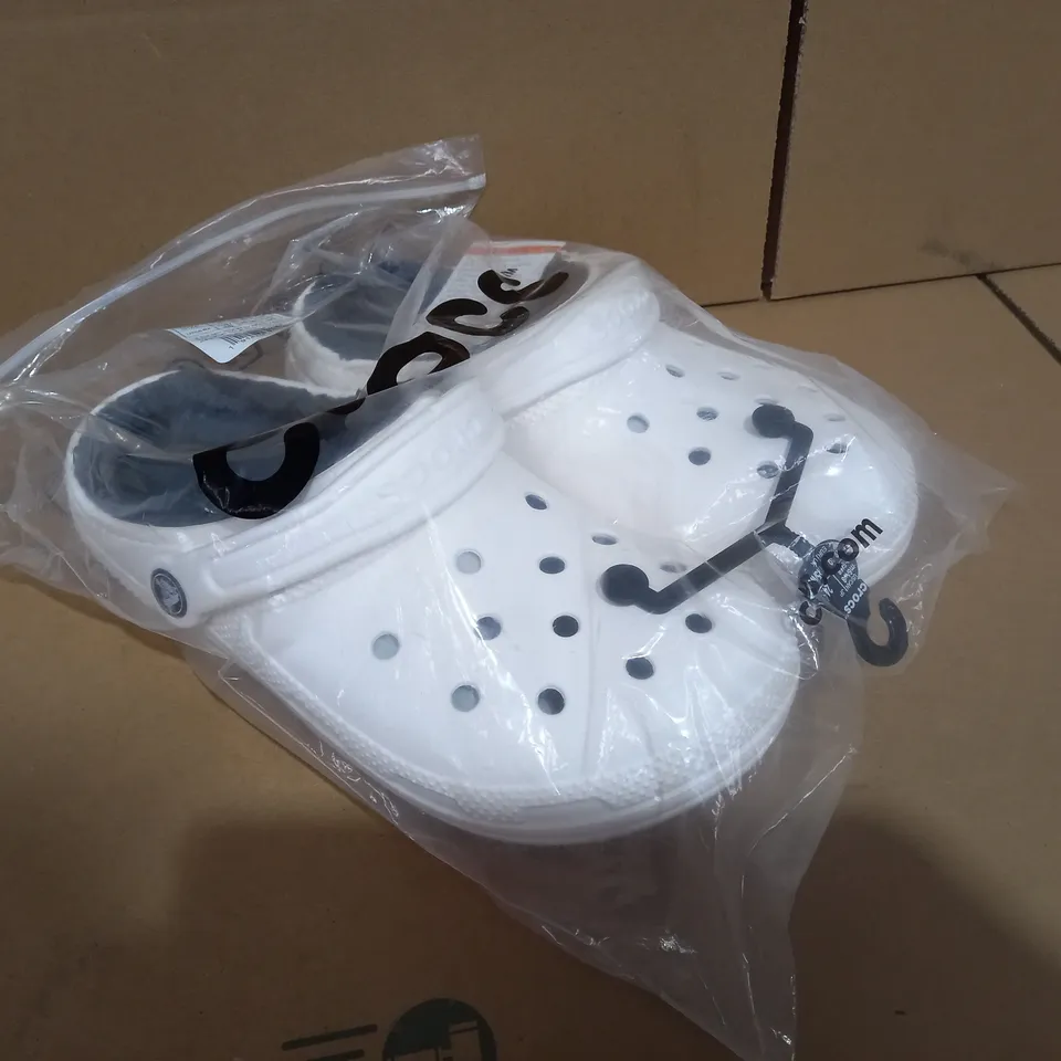 BOXED PAIR OF SIZE 38/39 WHITE CROCS 
