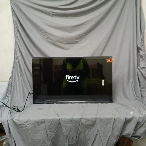 TCL TELEVISION DISPLAYING FIRE TV