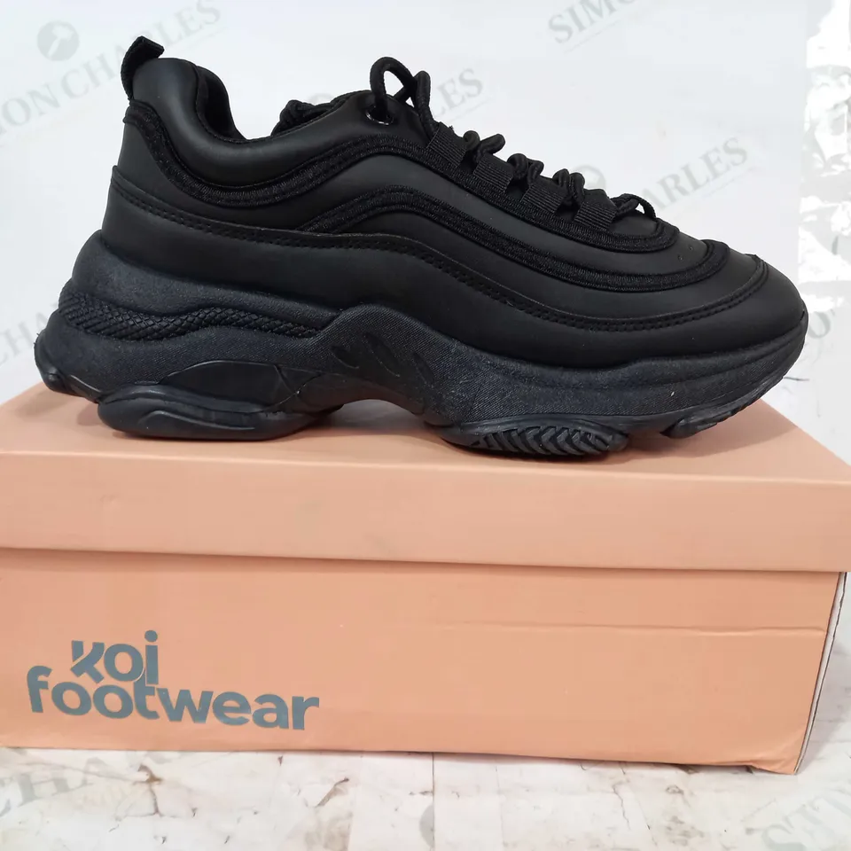 BOXED PAIR OF KOI FOOTWEAR CHUNKY TRAINERS IN BLACK EU SIZE 39