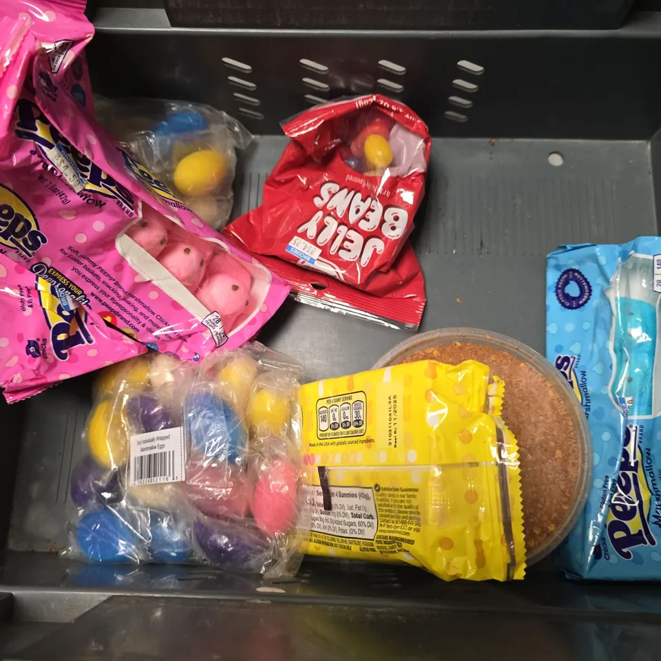 APPROXIMATELY 7 ASSORTED FOOD ITEMS TO INCLUDE - PEEPS , PRETZEL BITES , JELLY BEANS ETC