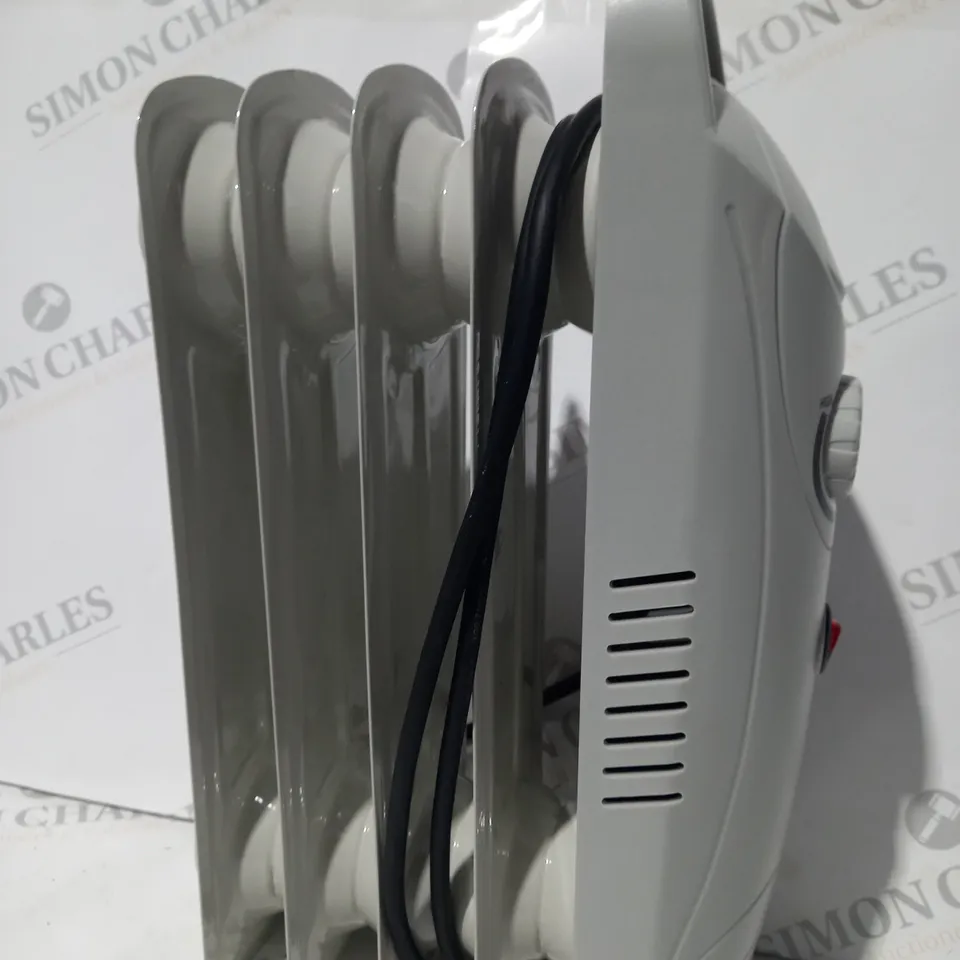 BOXED SWAN OIL HEATER IN WHITE RRP £19