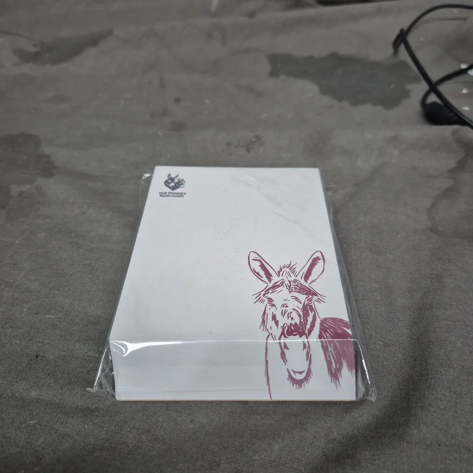 APPROXIMATELY 20 ASSORTED ITEMS INCLUDING GARDEN HOSE NOZZLE, GRINDING FLAP DISC, PUMP BOTTLE, THE DONKEY SANCTUARY STATIONERY