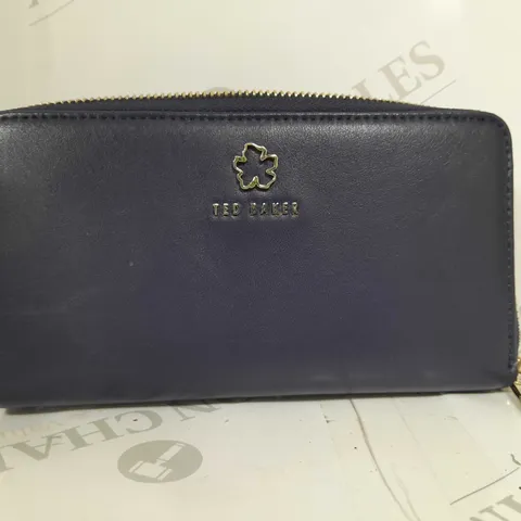 JORJANA FLOWER EYELET LARGE ZIP AROUND PURSE IN NAVY