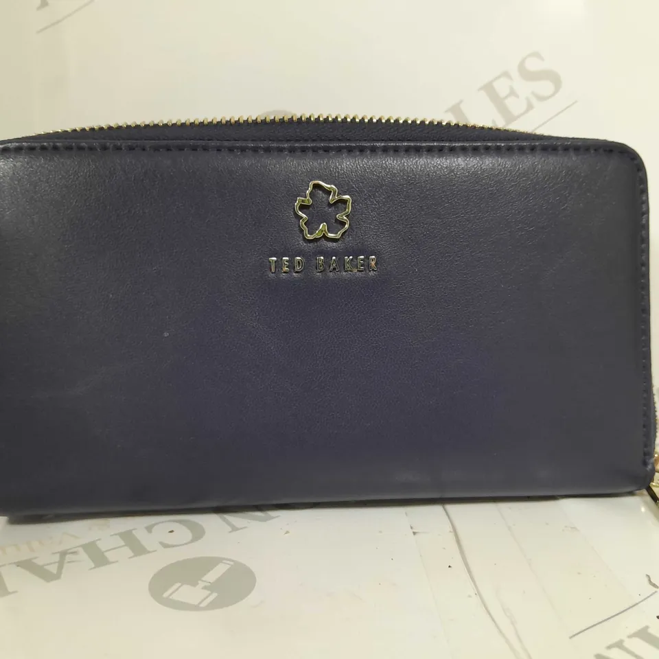 JORJANA FLOWER EYELET LARGE ZIP AROUND PURSE IN NAVY