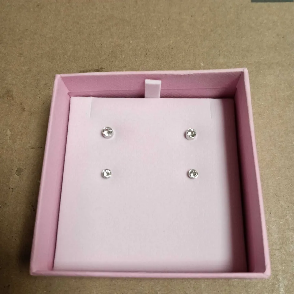 SWAROVSKI FOUR CLEAR CRYSTAL STUD EARRINGS IN PINK PRESENTATION BOX