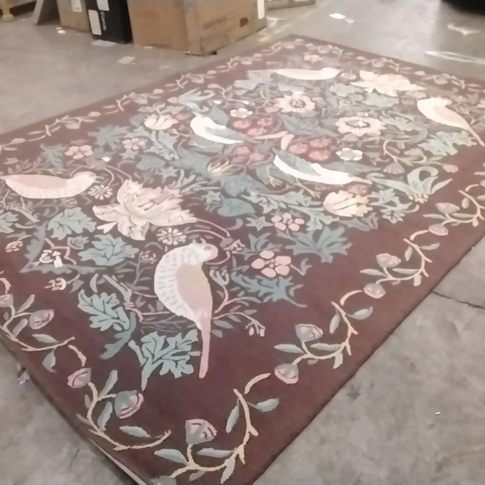 STILLAGE OF APPROXIMATELY 14 DESIGNER RUGS