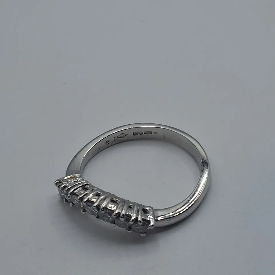 PLATINUM SEVEN STONE CURVED HALF ETERNITY RING SET WITH NATURAL DIAMONDS