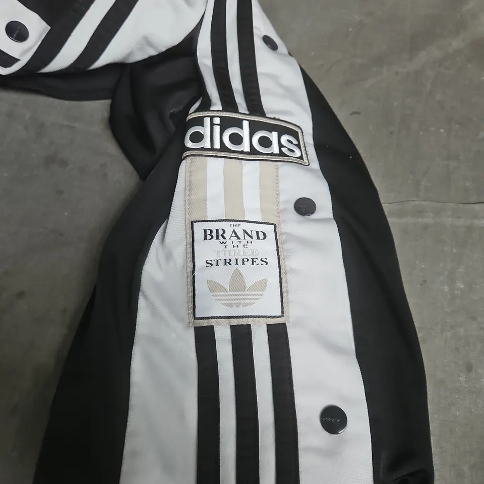 ADIDAS TRACK PANTS – THE BRAND WITH THE THREE STRIPES - SIZE 10