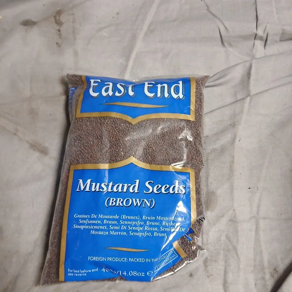 BOX OF APPROXIMATELY 10 ASSORTED FOOD ITEMS INCLUDING BHURU GINGER DRINK , EAST END MUSTARD SEEDS AND FANTA FRUIT TWIST